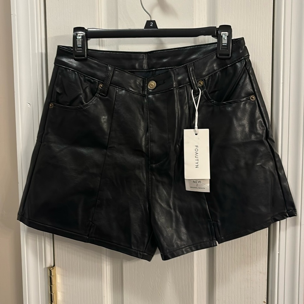 NWT. Foautyn pleather jeans shorts. Black. Size 8.